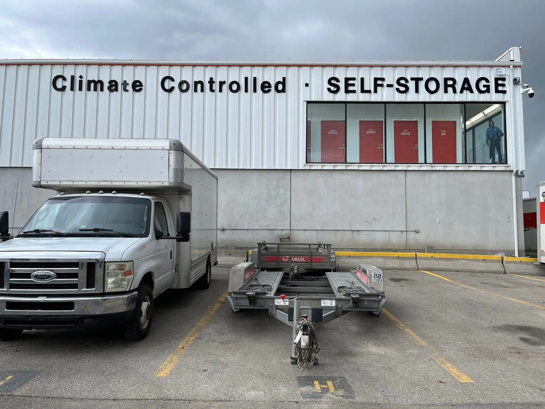 Large fabricated metal dimensional letters installed across the side of a commercial building